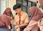 Inovasi Pemilu di SMPN 50 Surabaya: Demokrasi Modern Tanpa Kertas