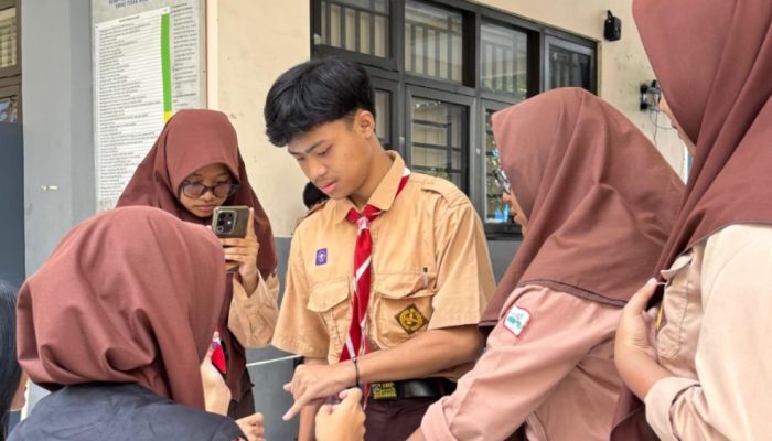 Inovasi Pemilu di SMPN 50 Surabaya: Demokrasi Modern Tanpa Kertas